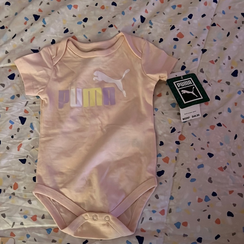 Pink puma onesie